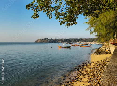 boats in the bay at Rawai beach Phuket Thailand