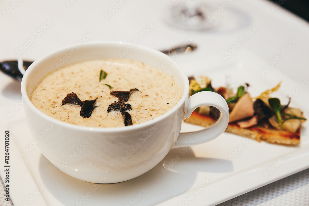 Fragrant French cream soup close-up. Restaurant serving Fragrant French cream soup close-up. Restaurant serving