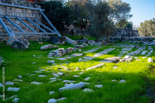 The ruins of Didyma are located a short distance to the northwest of modern Didim in Aydn Province, Turkey. It sits on a headland that in antiquity formed the Milesian Peninsula. Didyma was the larges photo