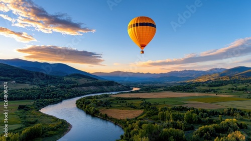 Stunning aerial view from a hot air balloon floating over a picturesque countryside landscape with mountains forests fields and a winding river at a beautiful sunset
