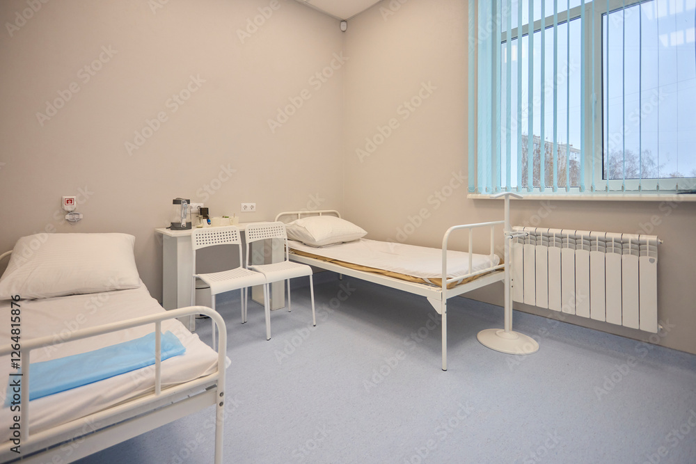 Fototapeta premium A Hospital Bed located within a Medical Facility designed for patient comfort and care