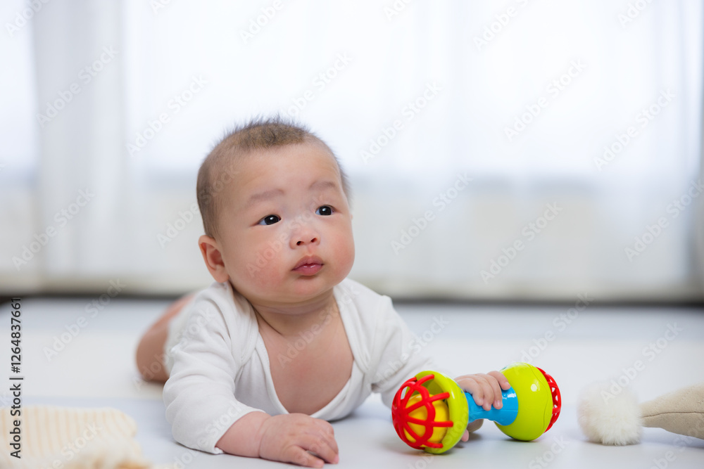 Little Baby Playing With Colorful Toy At Home Little Baby Playing With Colorful Toy At Home