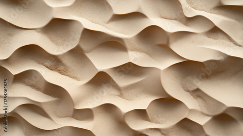 Intricate patterns of sand dunes create mesmerizing texture in warm tones