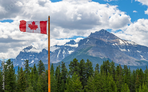 Canadian flag on pole in Jasper national park, Alberta, Canada.