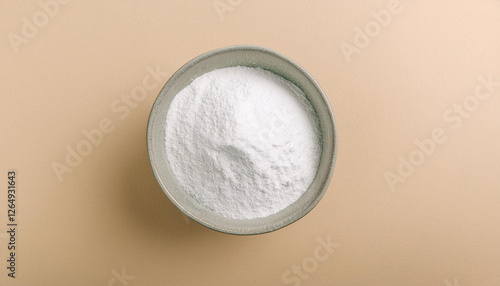 White zinc oxide powder in bowl. Chemistry and medicine concept. Flat lay. Close-up.
