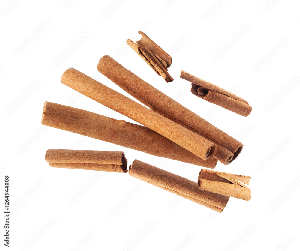 Sticks of cinnamon in the air close up isolated on a white background Sticks of cinnamon in the air close up isolated on a white background