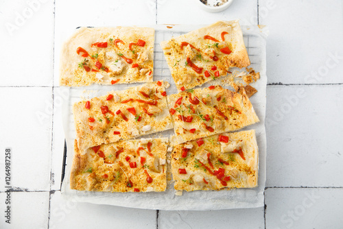 Chicken tart with pepper and chili sauce photo