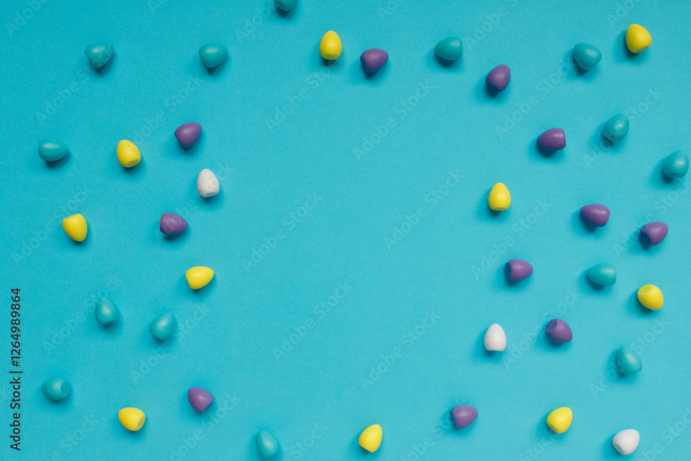 small colorful easter eggs on blue background small colorful easter eggs on blue background