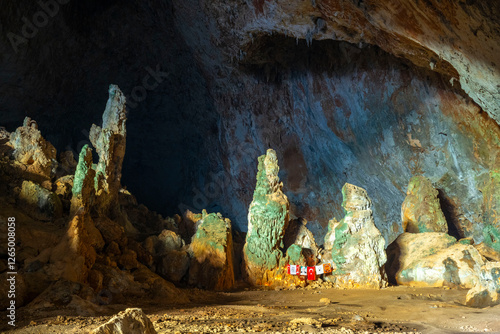 The cave is situated in Killik location of Ahirtas village at Dosemealti  district of Antalya Province.The cave is 633 m long and has two large chambers on the main gallery, which has a clearance. photo