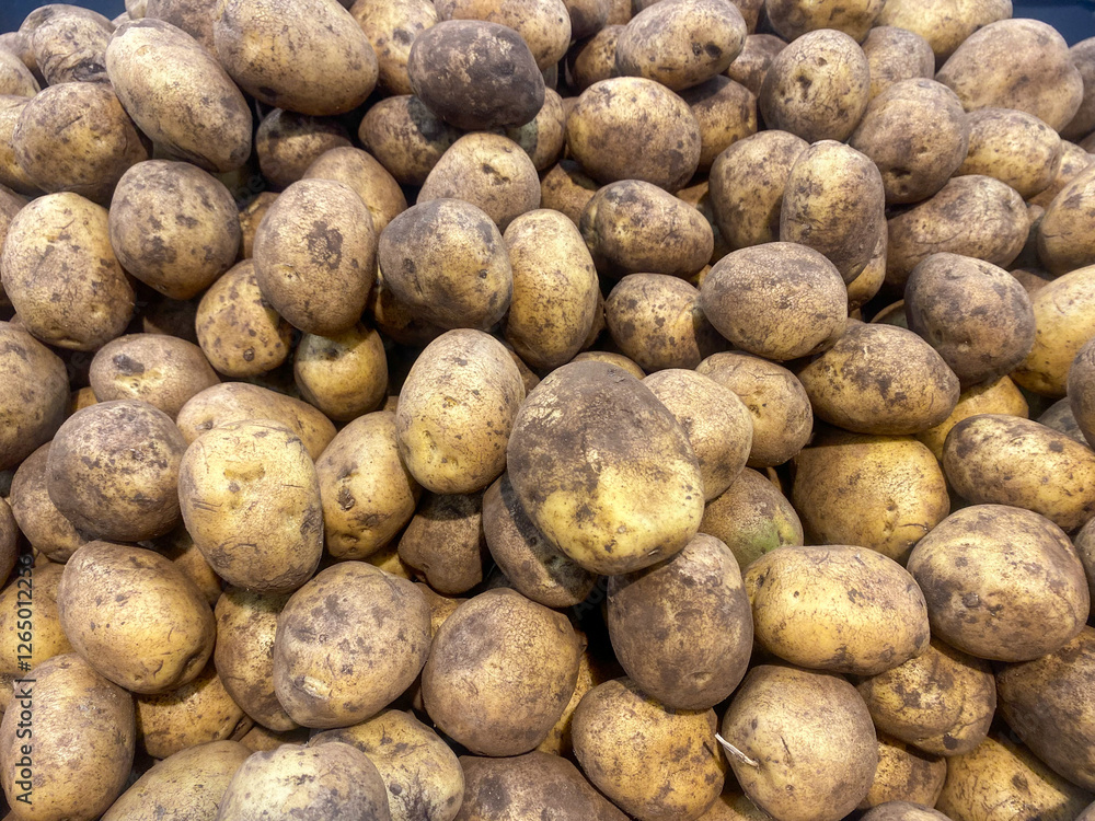 Young potatoes lie in a basket in a store for sale Young potatoes lie in a basket in a store for sale