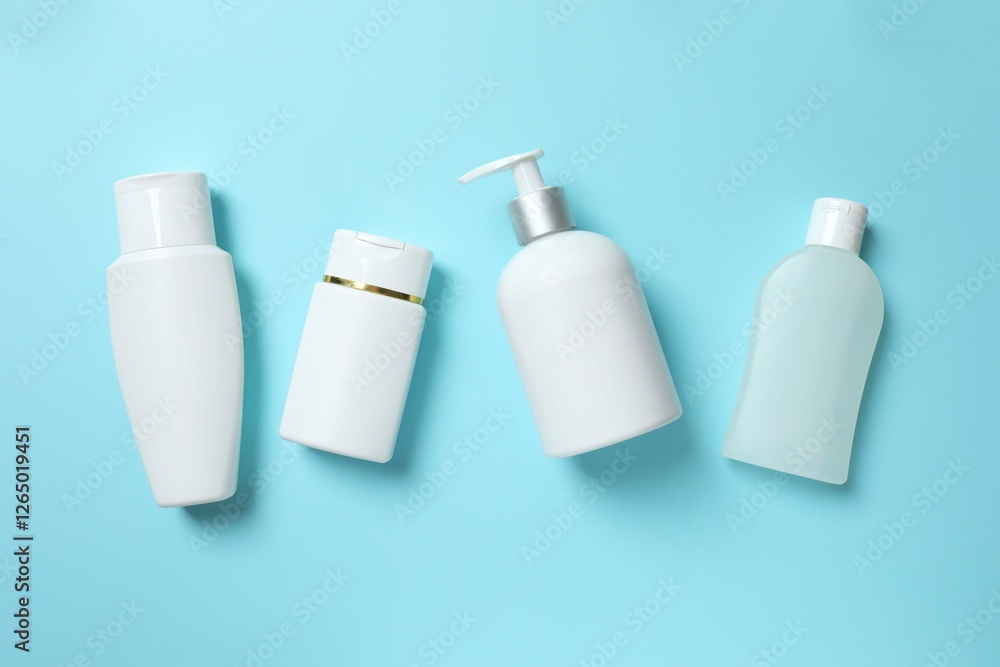 Natural cosmetic products on a blue background, top view Natural cosmetic products on a blue background, top view