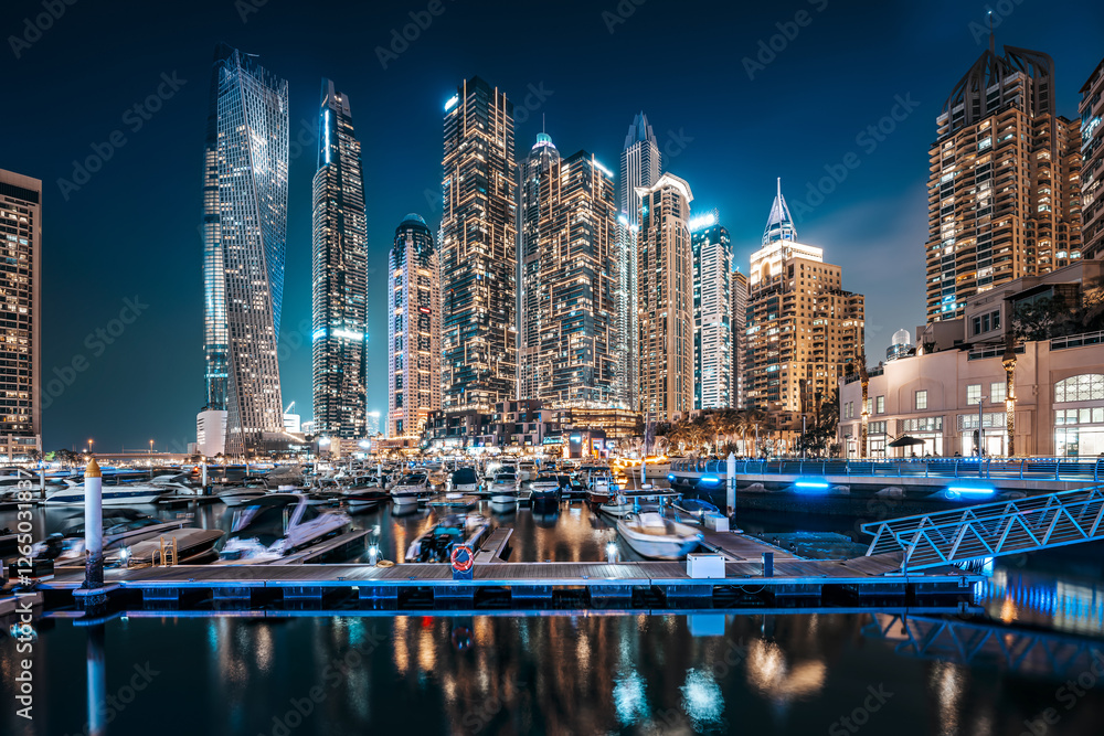 the skyscrapers of dubai marina at night