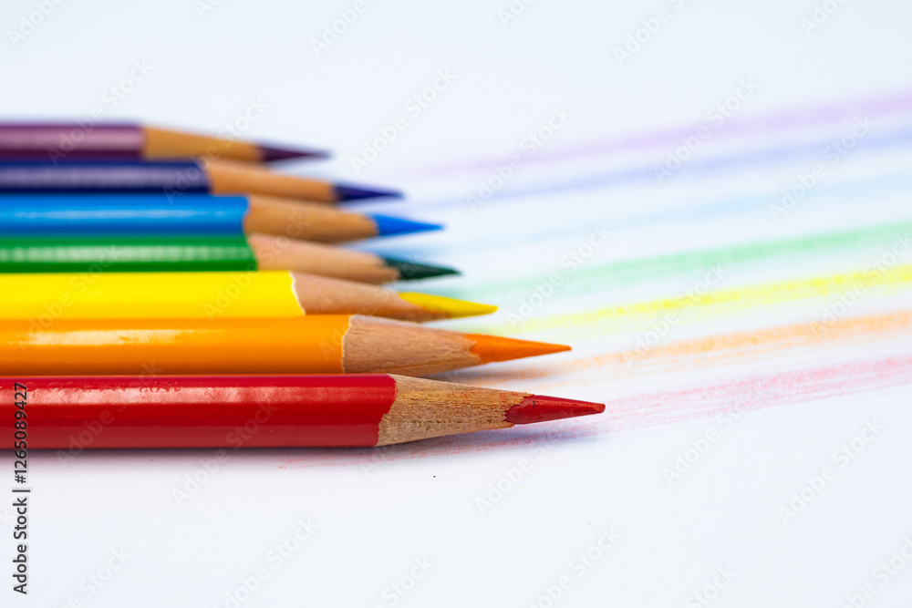 Useful office supplies such as colorful pencils and coloring Useful office supplies such as colorful pencils and coloring
