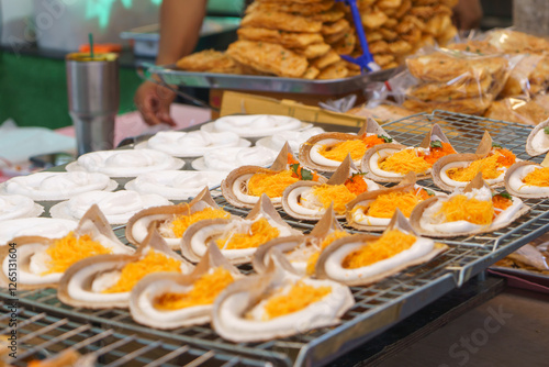 Thai Crispy Pancakes (Khanom Bueang) with Sweet Toppings photo