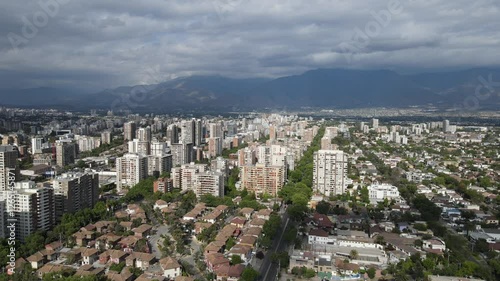 Wallpaper Mural Apoquindo avenue crosses las condes, a commune of santiago de chile, with cloudy sky and mountains in the background Torontodigital.ca