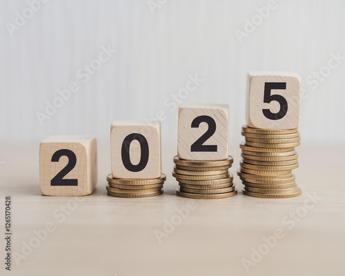 A clean and professional image showing the year 2025 with stacked coins, symbolizing growth, financial planning, investment, and wealth accumulation for the future.