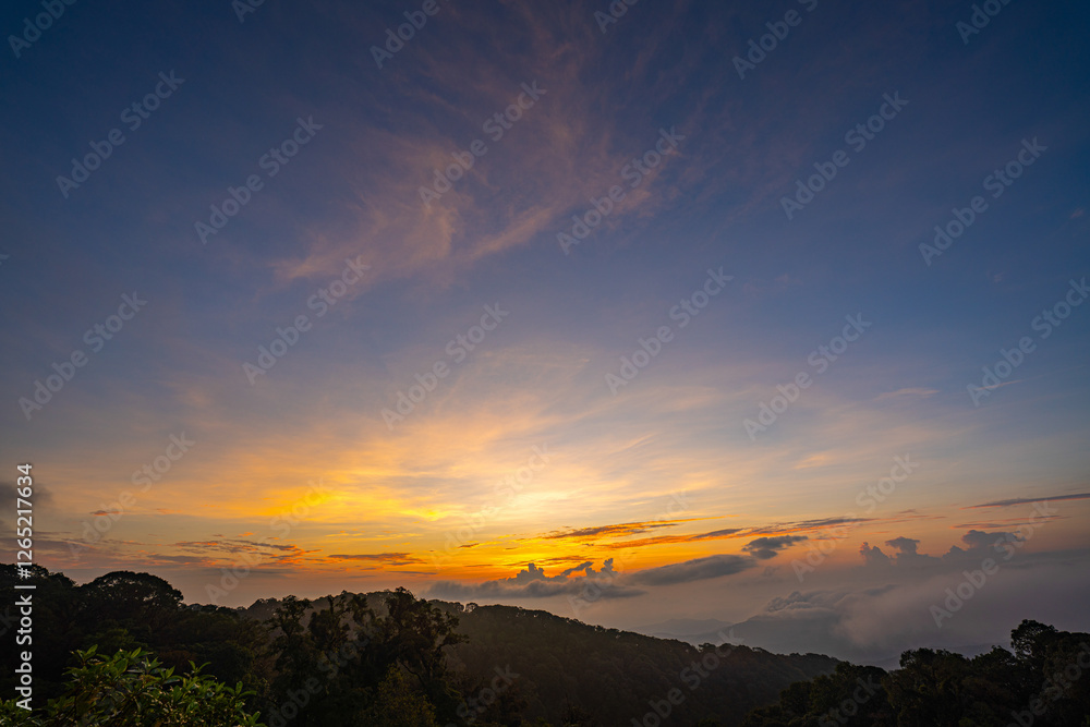 scenery sweet sky at twilight above The hills in the foreground add depth and contrast to the misty valleys in the distance. atmospheric scene that beautifully majesty of nature. scenery sweet sky at twilight above The hills in the foreground add depth and contrast to the misty valleys in the distance. atmospheric scene that beautifully majesty of nature.