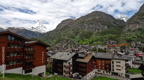 Wallpaper Mural The Gornergrat Bahn train runs downhill towards Zermatt through the Alpine landscape in Zermatt, Switzerland Torontodigital.ca