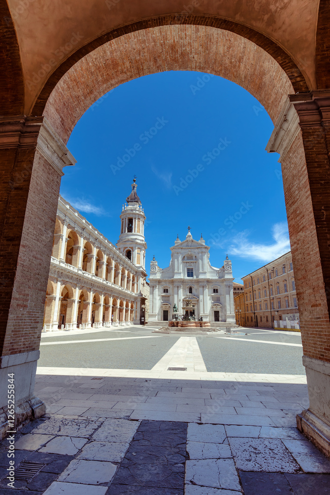 Basilica Della Santa Casa in Square of Loreto on a sunny day with clear blue skies. Loreto, Marche, Italy
