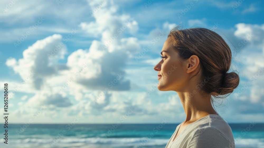A Woman Reflecting on the Ocean with Serene Clouds A Woman Reflecting on the Ocean with Serene Clouds
