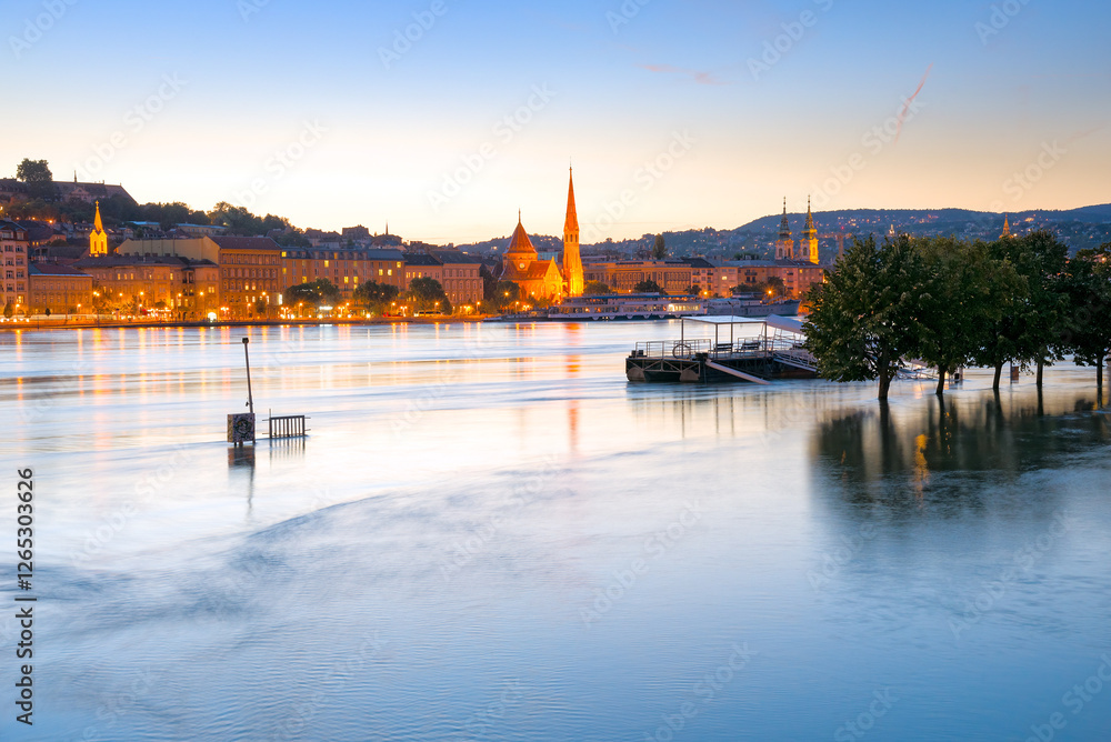 Fototapeta premium Panorama of Budapest across the flooded river at night