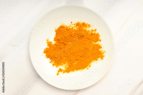 Turmeric on a Tray on a White Background
