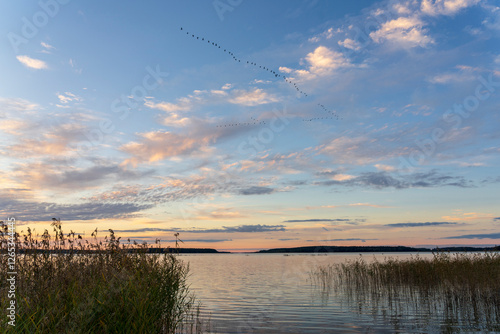 Fototapeta Naklejka Na Ścianę i Meble -  Lake Seksty. Landscape of Masuria in Poland, Karwik village in the Pisz area.