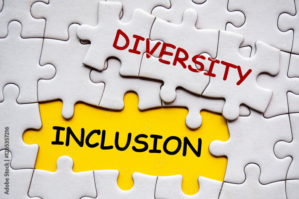 Diversity and Inclusion text on jigsaw puzzle. D and I concept Diversity and Inclusion text on jigsaw puzzle. D and I concept