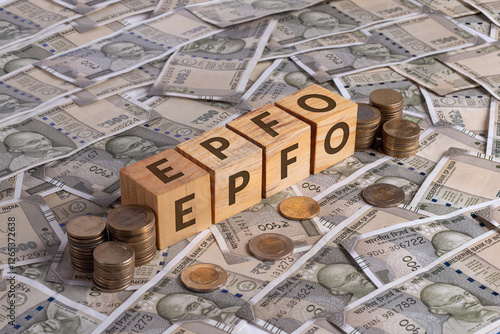 EPFO Word on Wooden Cubes with Indian Currency and Coins | Financial Investment Concept