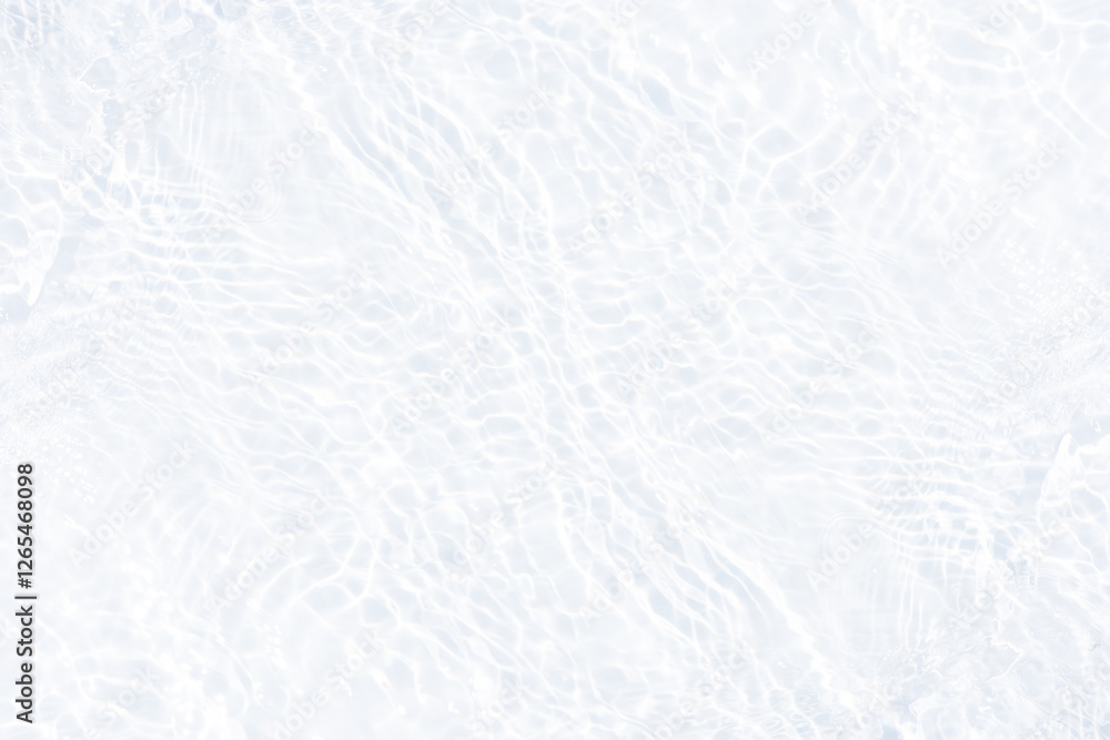 Fototapeta premium White water with ripples on the surface. Defocus blurred transparent white colored clear calm water surface texture with splashes and bubbles. Water waves with shining pattern texture background.