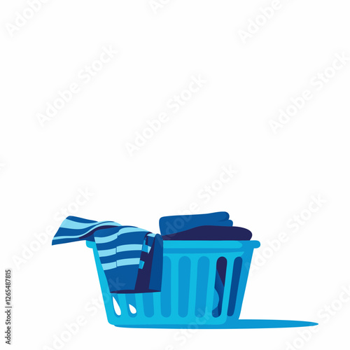 Light blue laundry basket with navy clothes spilling over edge. Clean minimal composition on white background. Concept: laundry service, home organization, housekeeping