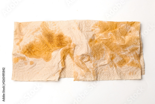oil stains on kitchen tissue isolated on white background
