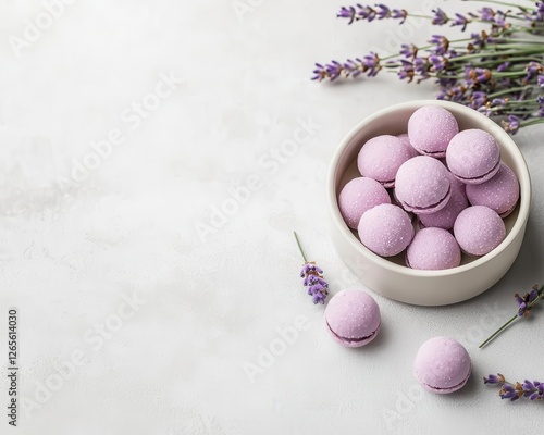 A delicate lacepatterned tin filled with lavender and honeyflavored sweets photo