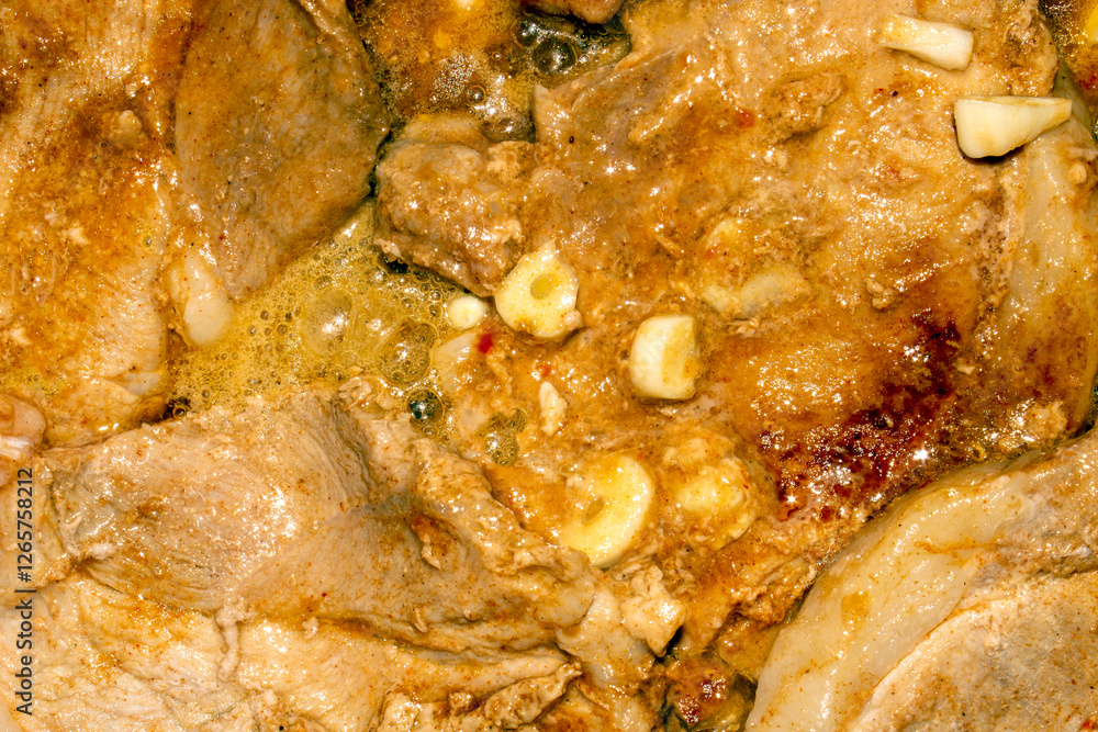 Pork meat in hot sauce with garlic.Roast pork meat in tomato sauce.Pork baked meat.Pork stew. Pork meat in hot sauce with garlic.Roast pork meat in tomato sauce.Pork baked meat.Pork stew.