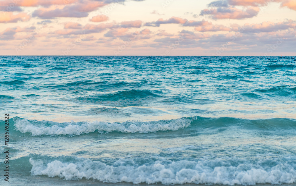 Obraz premium Cloudy sky and seascape at summer vacation. Skyscape with sea horizon. Calm horizon view at sea sunrise. Romantic summer vacation sunrise on seascape. Sea horizon view. Sea breeze