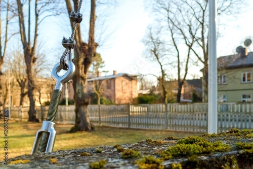 Картината върху платно Turnbuckle. Steel cable. The taut cable holds the mast.