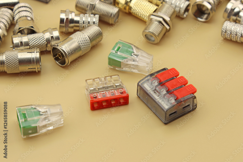 Metal F-connectors for connecting coaxial cables. Close-up. Metal F-connectors for connecting coaxial cables. Close-up.
