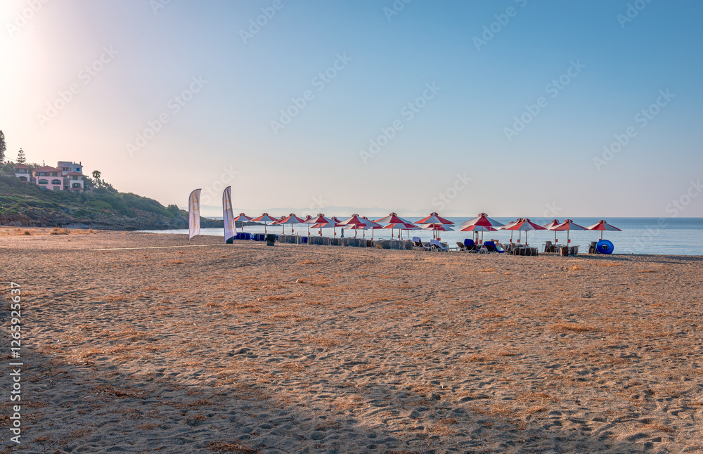 Obraz premium Sunrise in Mavrovouni coast, the largest and most beautiful beach in East Mani, Peloponnese, Greece. Its length is about 5 km and it has a wonderful sandy beach (coarse sand).
