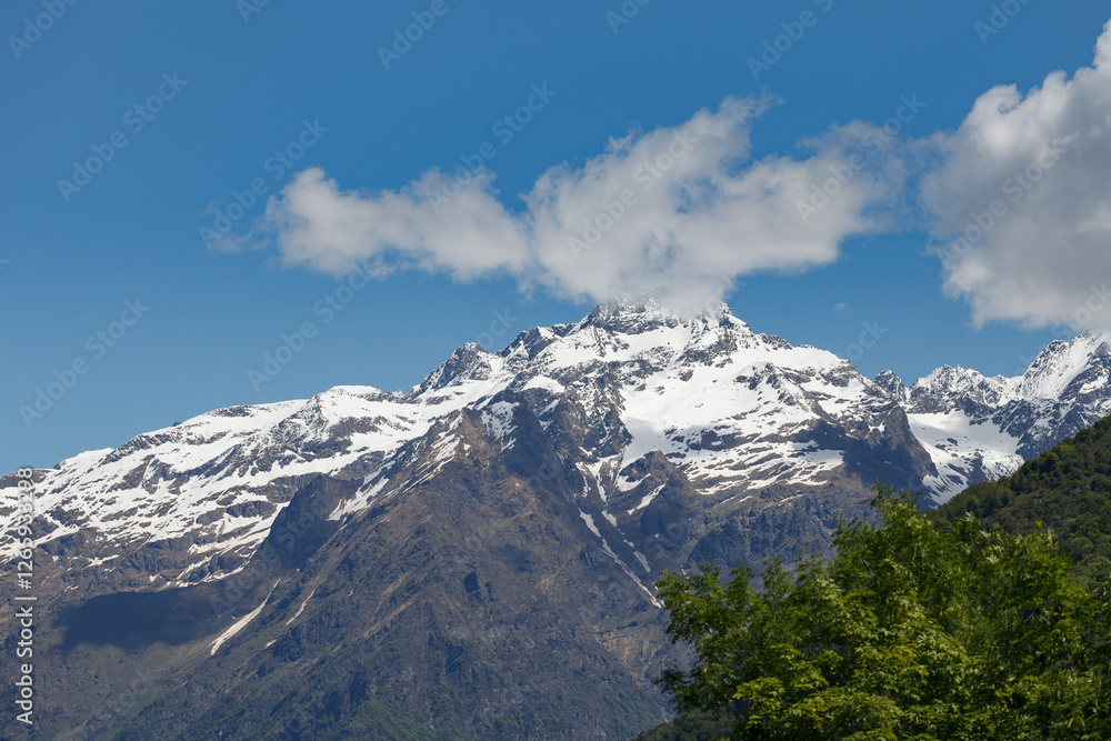 Snow-capped Bergamo alps. View from Gromo town.