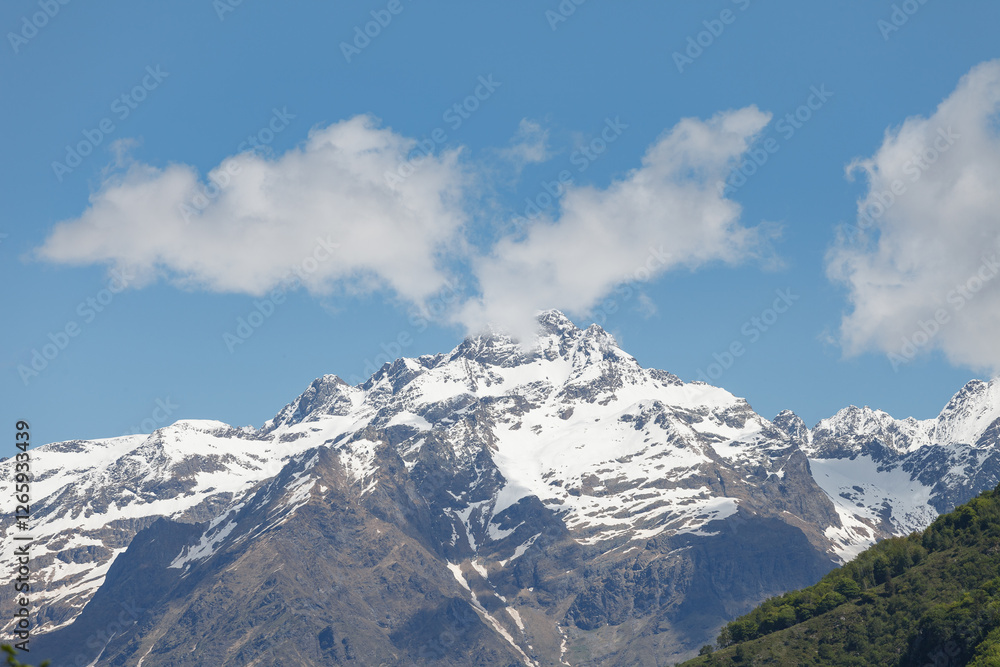 Snow-capped Bergamo alps. View from Gromo town.