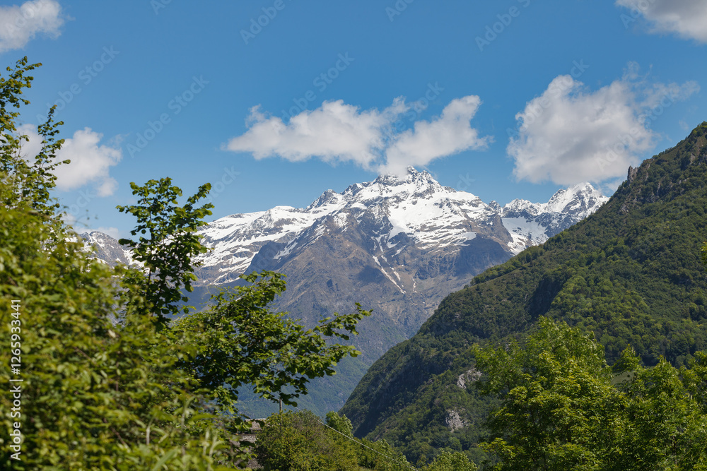 Snow-capped Bergamo alps. View from Gromo town.