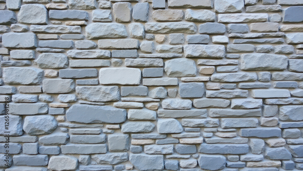 Fototapeta premium Natural stone wall creates a rustic backdrop for any setting