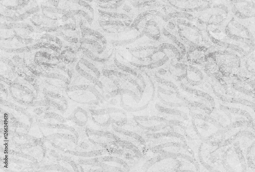 Arabic calligraphy wallpaper on a white wall with a black interlocking background subtitles "interlacing Arabic letters"