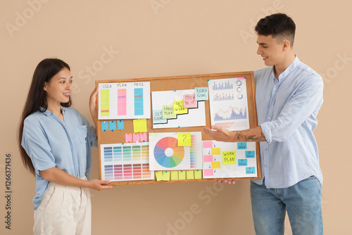 Colleagues with business pl...