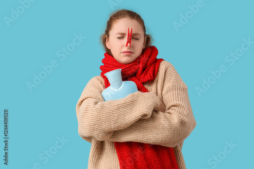 Ill young woman with clothe...