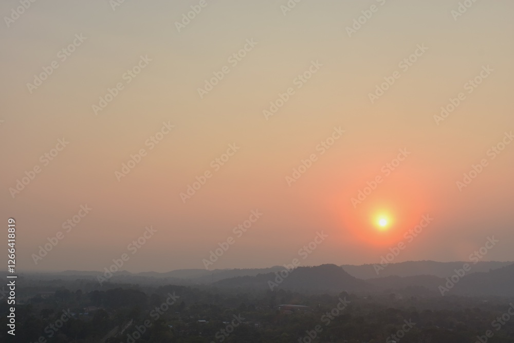 sunset into mountain at Khun Dan Prakarn Chon huge concrete dam in evening on Thailand sunset into mountain at Khun Dan Prakarn Chon huge concrete dam in evening on Thailand