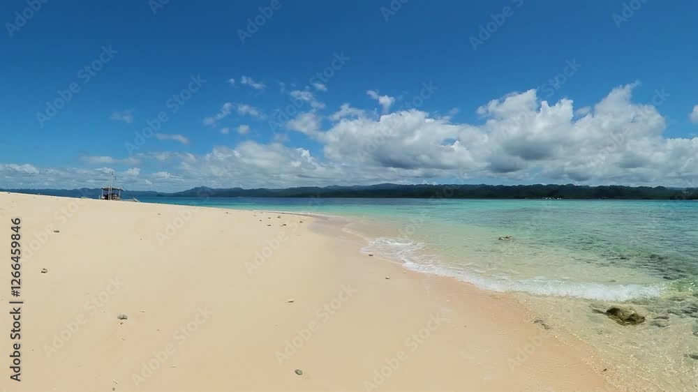 Transparent ocean waves on shoreline. Surigao de Sur, Philippines. Transparent ocean waves on shoreline. Surigao de Sur, Philippines.