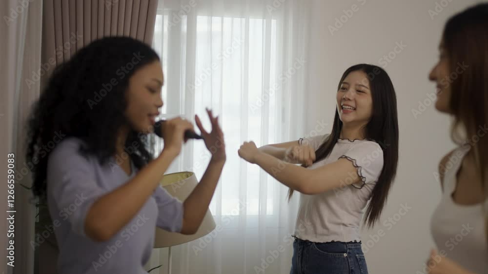 Friendship of young women sing and dance together. Leisure activity, relationship. Friendship of young women sing and dance together. Leisure activity, relationship.