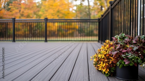 Elderly Accessible Design Concept, Elegant Outdoor Deck with Non-Slip Surface and Colorful Planters in Vibrant Autumn Scenery