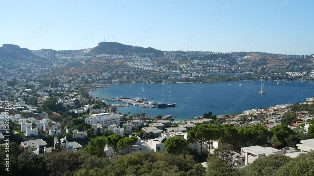 A panoramic summer view of Gundogan bay. Beautiful holiday resort on the Bodrum peninsula. Mugla province, Turkey country - 4K video A panoramic summer view of Gundogan bay. Beautiful holiday resort on the Bodrum peninsula. Mugla province, Turkey country - 4K video